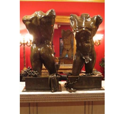 Pair bronze nude male torso sculptures